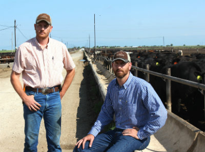 "The Tiffany Boys" don't really have defined positions in the feed yard but if roles were to be assigned Shawn (left) would be operations manager and Shane (right) would be business manager. Shane explains that he makes the promises and Shawn carries them out.