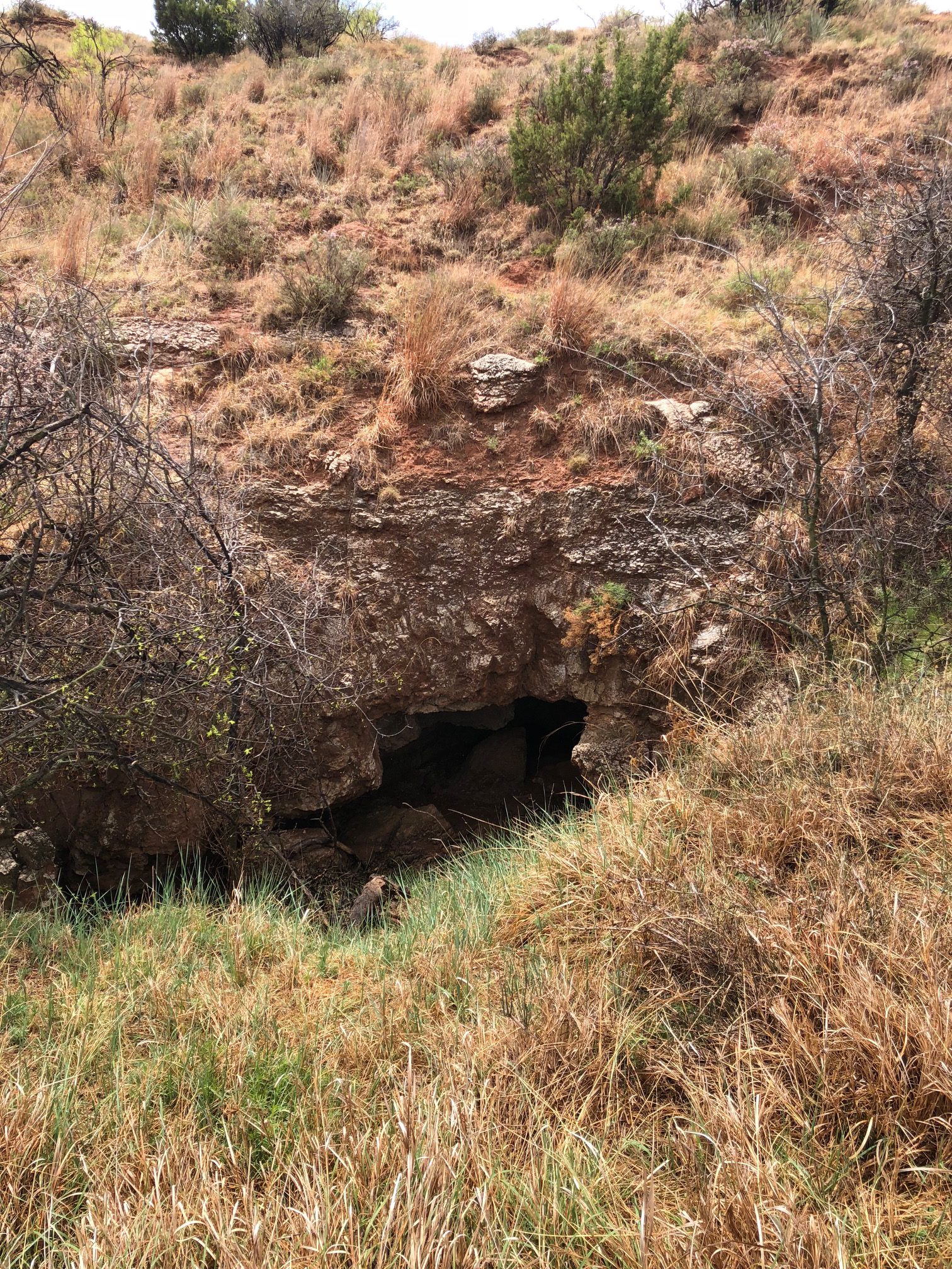 It might just look like a hole in the ground, but it's name is 'Black Hand Cave'. When up close a black handprint can be seen marking this old hideout of the famed criminal duo, Bonnie and Clyde. It's just one of the treasures hidden in the B3R pastures.